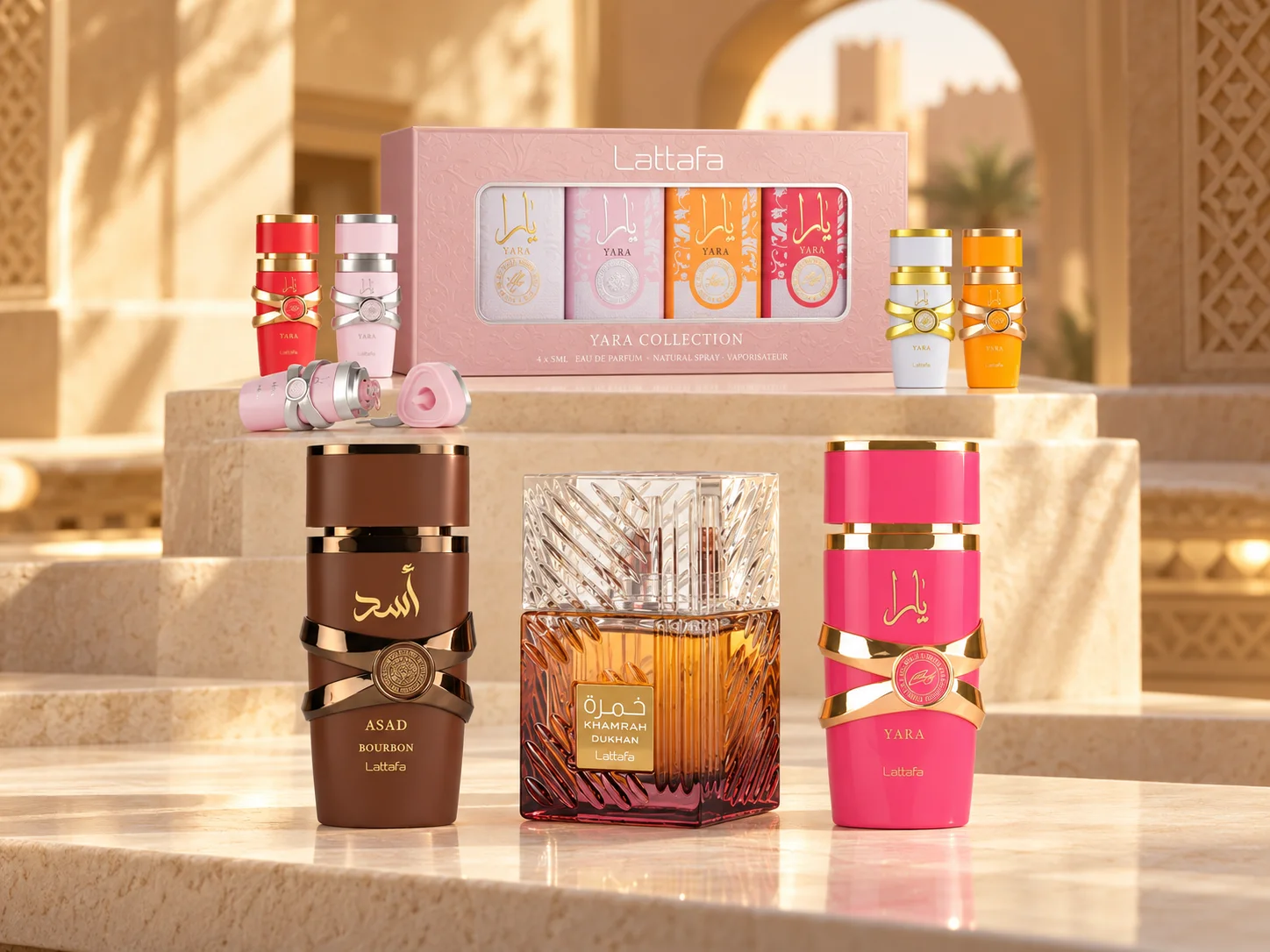 Coffret Nuit Gourmande : la Yara Collection et ses quatre miniatures, Asad Bourbon, Khamrah Dukhan et Yara Candy en 100 ml, sur des marches de pierre claire au soleil.